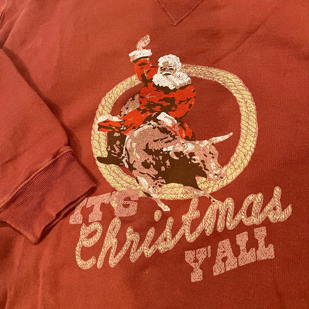 Mallory Ervin Christmas sweatshirt.